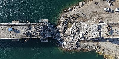 Suriye hükümeti, terör örgütü YPG'nin Rakka'da patlattığı köprüleri tadilata başladı